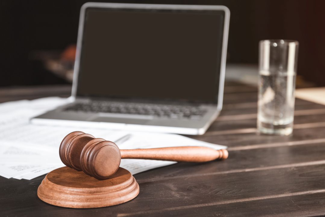 Legal Professional Reviewing Trademark Documents and Domain Registration Trademark law, domain registration, legal compliance, intellectual property, business attorney