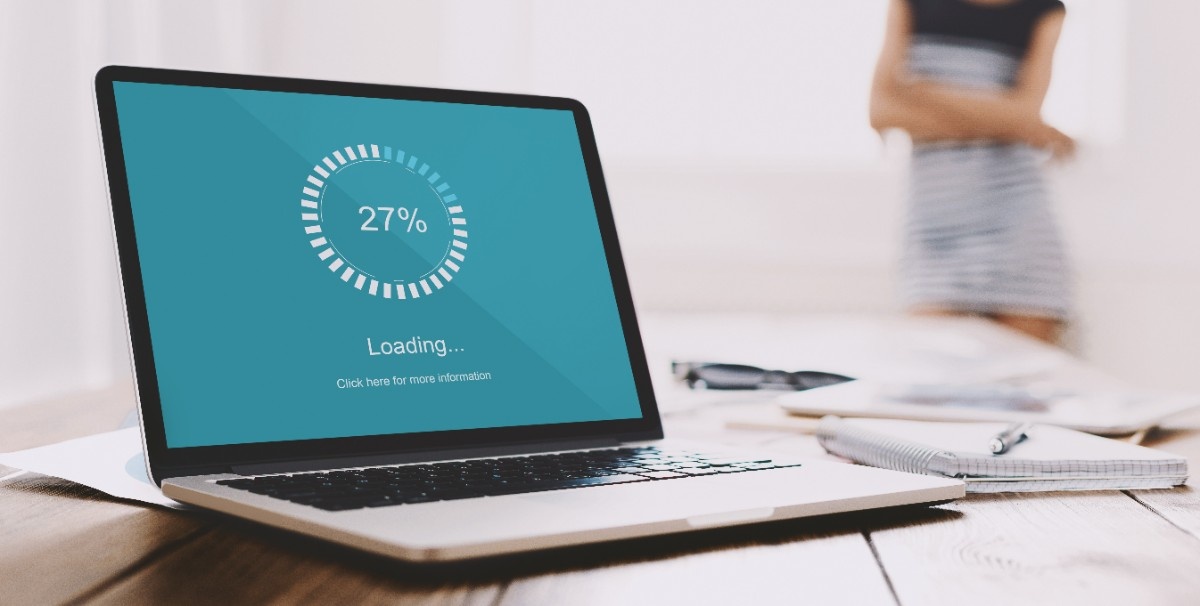 Computer screen showing website performance metrics, load times, and technical optimization scores